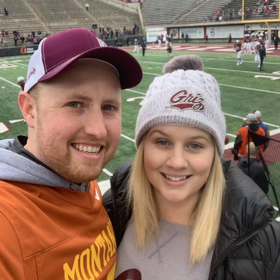 Sarah and husband at football game