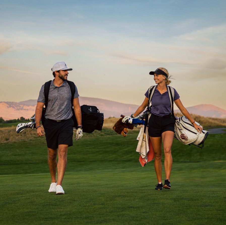 Cam and wife golfing