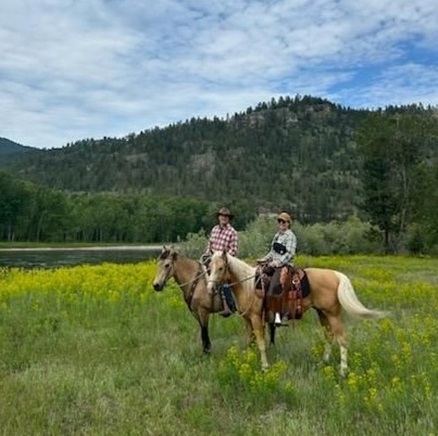 Chris and wife on horseback